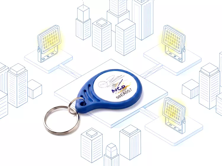 Illustration du badge MGP Matic connecté à l'éclairage LED de bâtiments municipaux